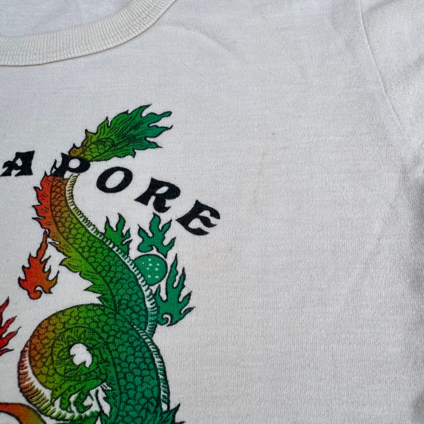 70s Kids Vintage Singapore Dragons Print on a Beige Short Sleeve T-Shirt 5Y 6Y